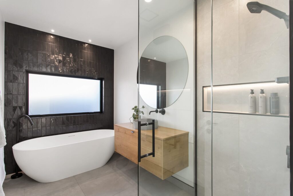 Contemporary bathroom in a new build house, featuring modern house design suited for luxury homes for sale, affordable housing, and architectural homes, appealing to buyers looking for modern homes and new homes for sale.
