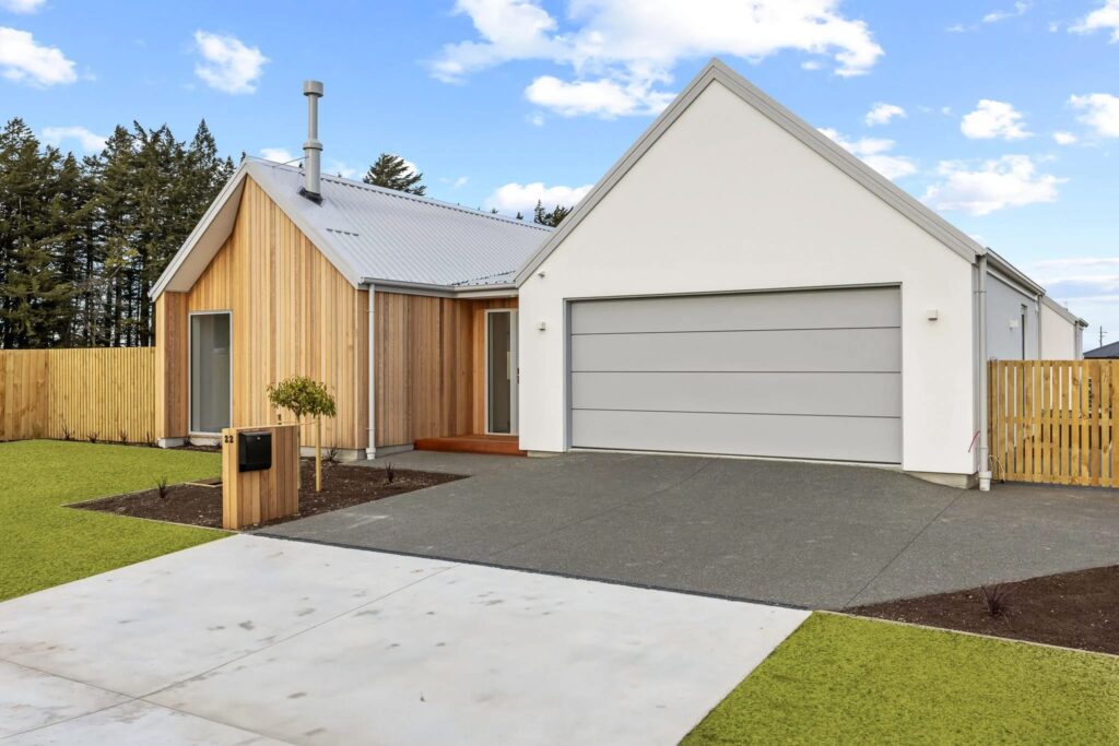 Front exterior of a modern new home featuring architectural styling, ideal for buyers interested in homes for sale, new houses for sale, affordable homes, and luxury homes within house and land offerings.