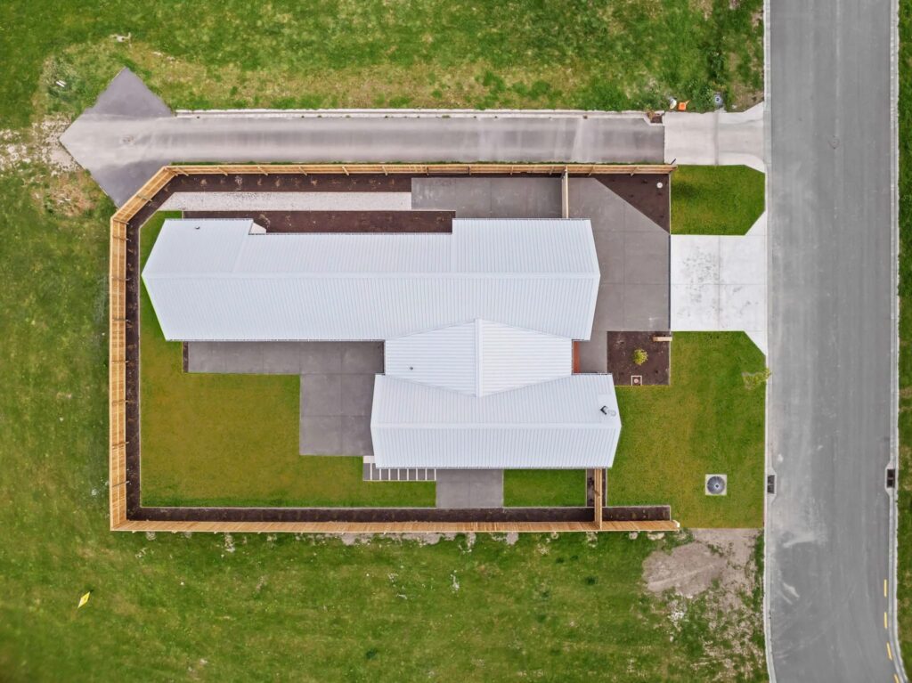 Aerial view of modern houses for sale and surrounding land for sale, showcasing a new build home layout suited for house and land packages, affordable housing, and buyers searching for property for sale or home and land packages.