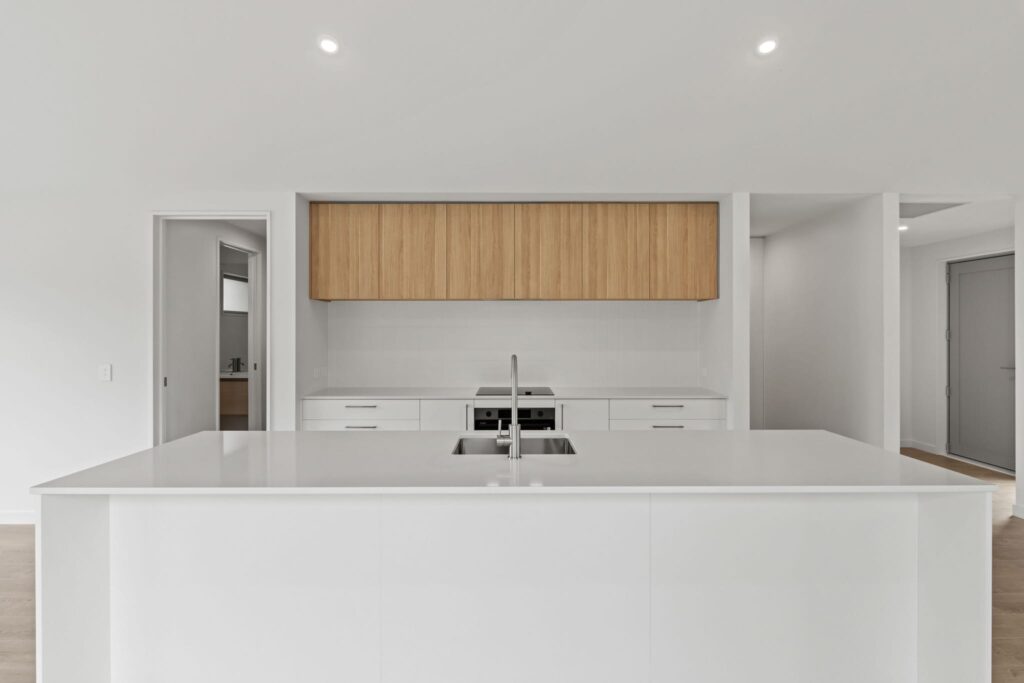 Bright contemporary kitchen in a modern house, appealing to buyers considering new build houses, affordable homes, luxury homes for sale, and modern houses for sale.